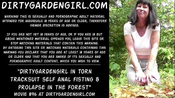 Dirtygardengirl in torn tracksuit self anal fisting & prolapse in the forest