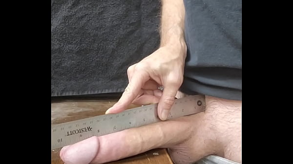 Measuring big white cock