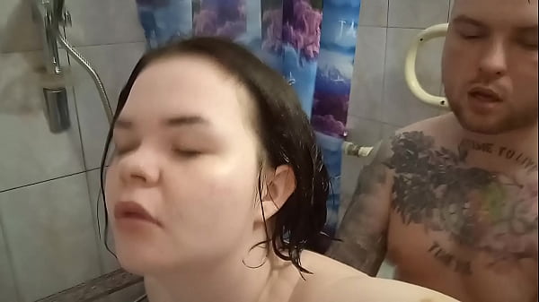 An amateur couple fuck in the bathroom after taking a shower