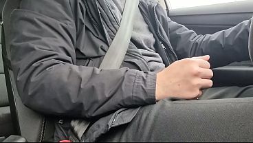 Stroking cock while driving
