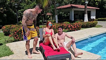 Submissive Redhead Gets a Hardcore Double Penetration by the Pool – Andrea Castro
