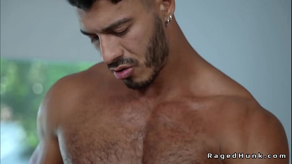Oiled gays have oral sex by the outdoor pool