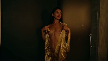 Wet and passionate sex in a dimly lit shower